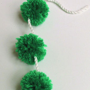 Simple and speedy. pompoms on a cord. Instructions to do so are included in all of our kits.