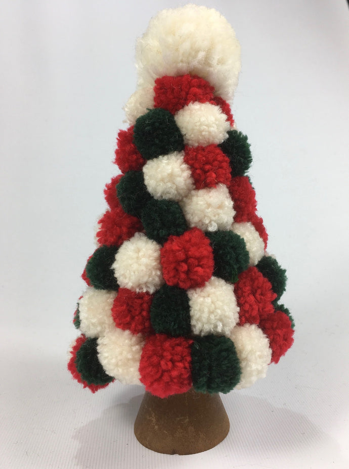 50 tiny pompoms adorn this little tree. They were made 14 at a time on a Multipom, so quick to make.