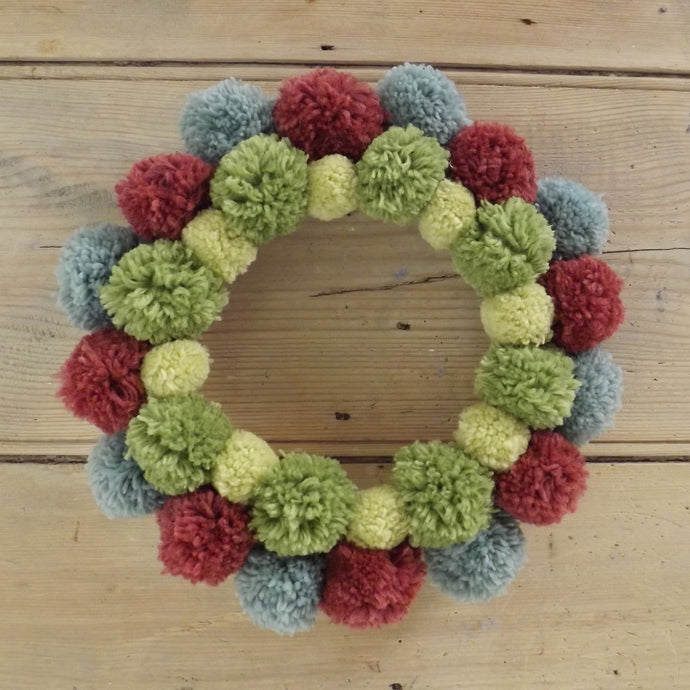 All of your left over wools can be used to make a mixed autumnal wreath. We have ours hung on our bedroom door.