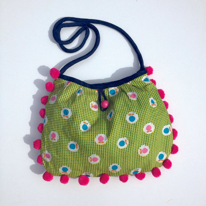 The pattern to make this little bag is in our project book.