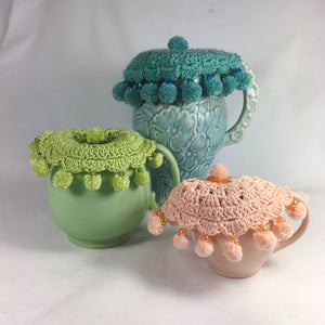 These pretty jug covers will keep the beasties out!