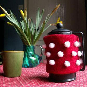 Coffee Cosy - Brighten up your morning by making your coffee pompom happy. Make this with any of our kits.